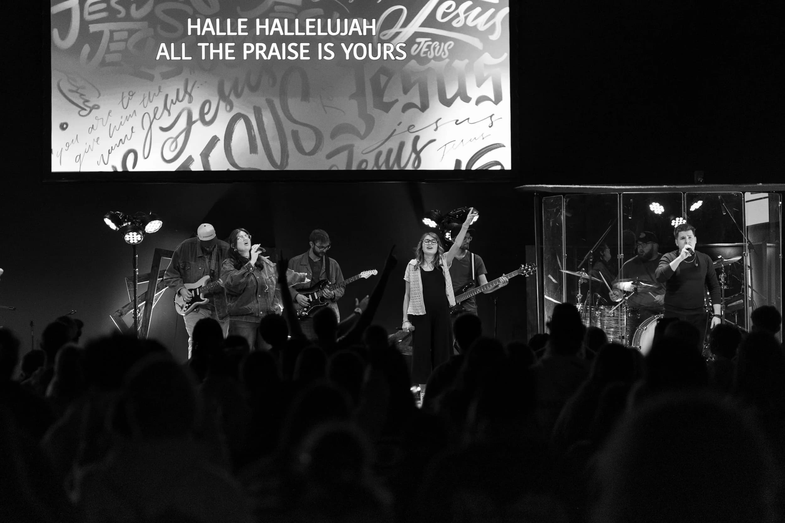 The band leading worship on stage